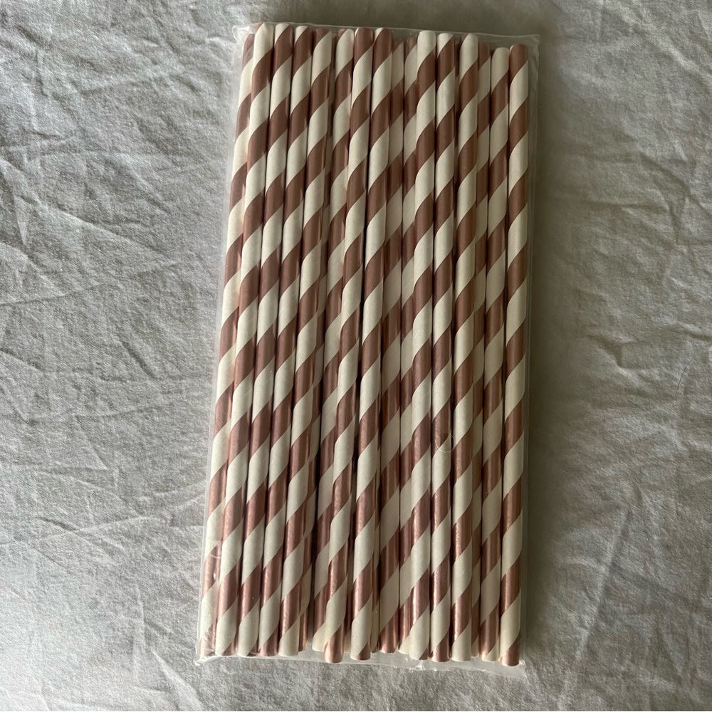 Rose gold and white paper straws